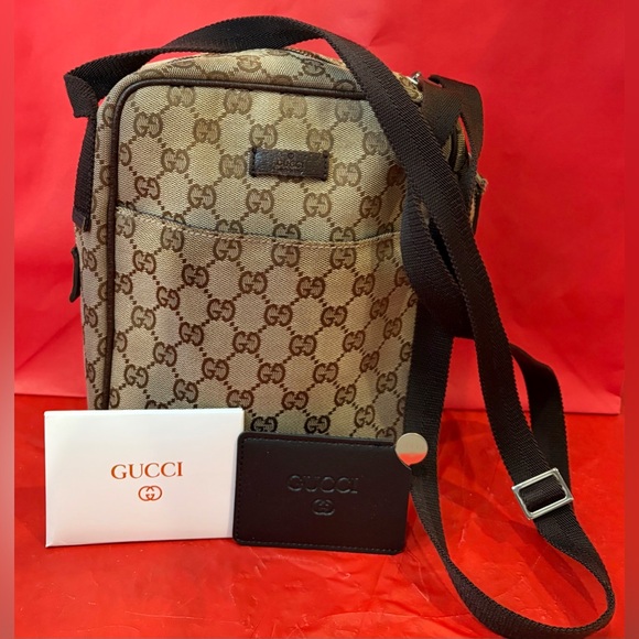Gucci Other - AUTHENTIC GUCCI GG Monogram Coated canvas Beige/Brown Messenger Bag
EUC!! LOVED